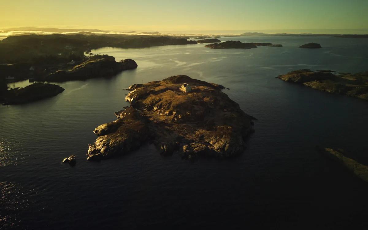 Drone view of an isolated island at golden hour