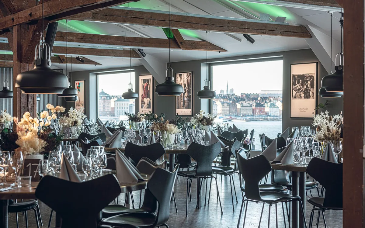 Fotografiska Stockholm: The dining room, laid for dinner, with the view over Stockholm