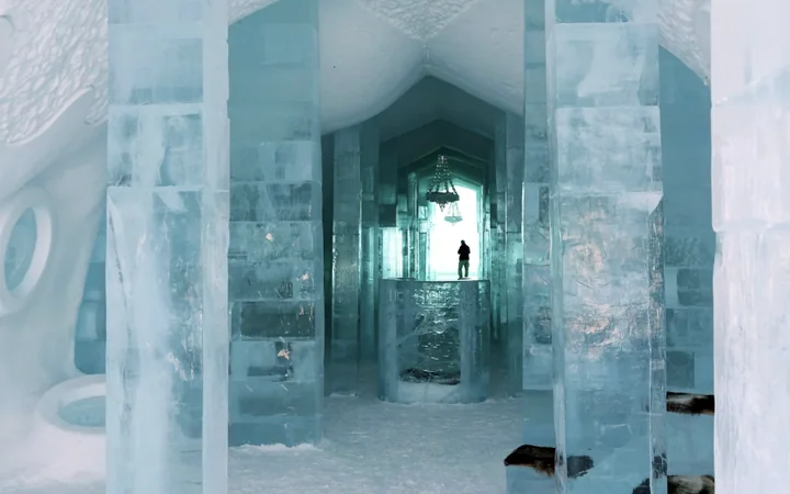 ICEHOTEL: An ice hall of carved columns and vaults